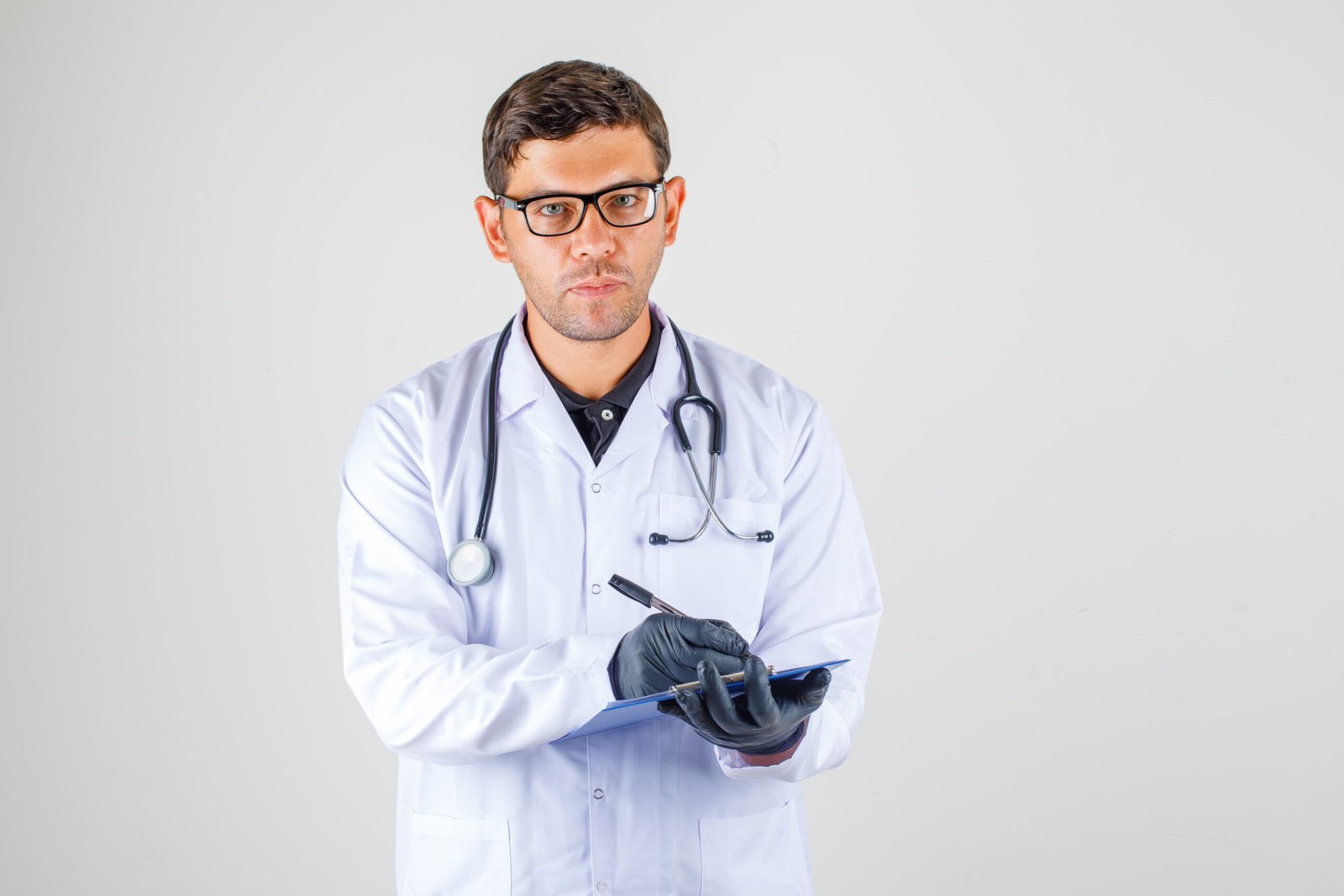 doctor-taking-notes-medical-white-robe (1)