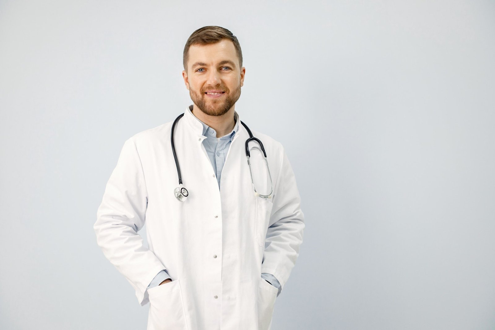 portrait-male-physician-looking-camera-isolated-white-background (1)